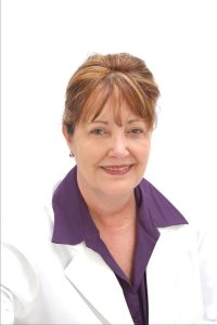 A Legal Nurse Consultant, wearing a white coat, advises with expertise in nursing and law.